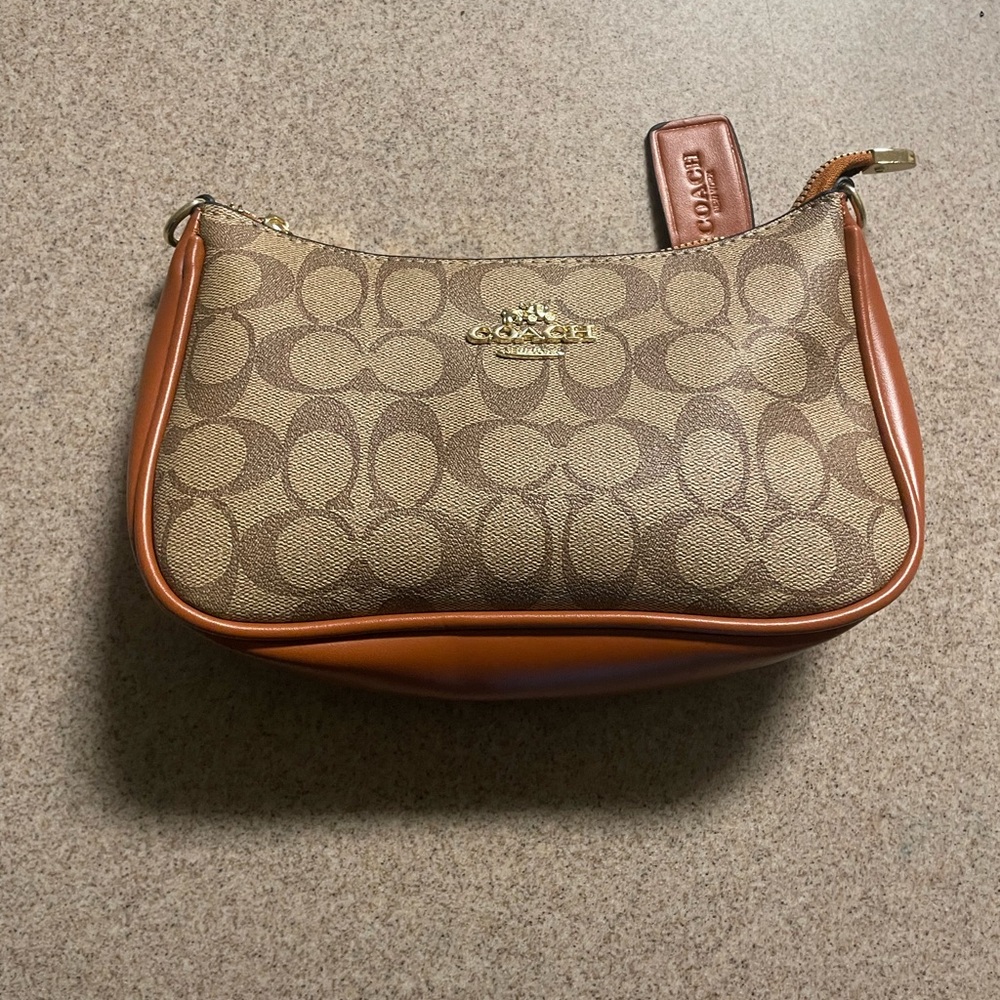 Coach Tan and Brown Signature Clutch